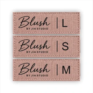 Custom woven size labels in blush pink with S, M and L letters