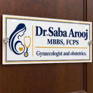 Acrylic doctor name plate with spacers on a wooden clinic door