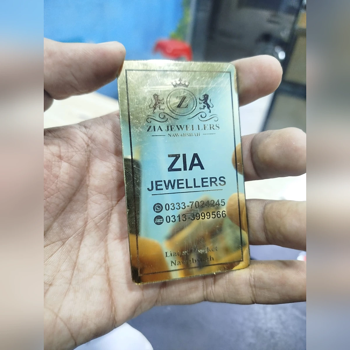 Golden acrylic business card with round corners