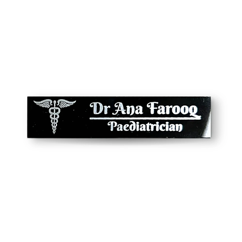 WM black custom name badge for doctors with silver caduceus logo